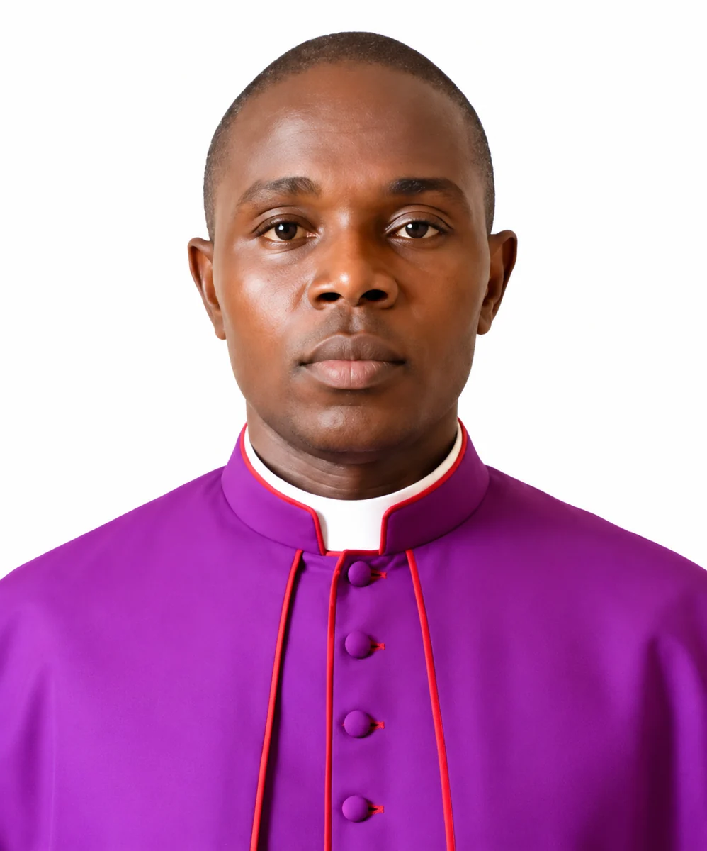 Official portrait of Bishop Prof. Dr. Amb. Ishmael L. Togbah in a purple episcopal cassock
